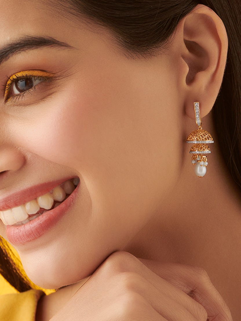 diamond earrings by CaratLane