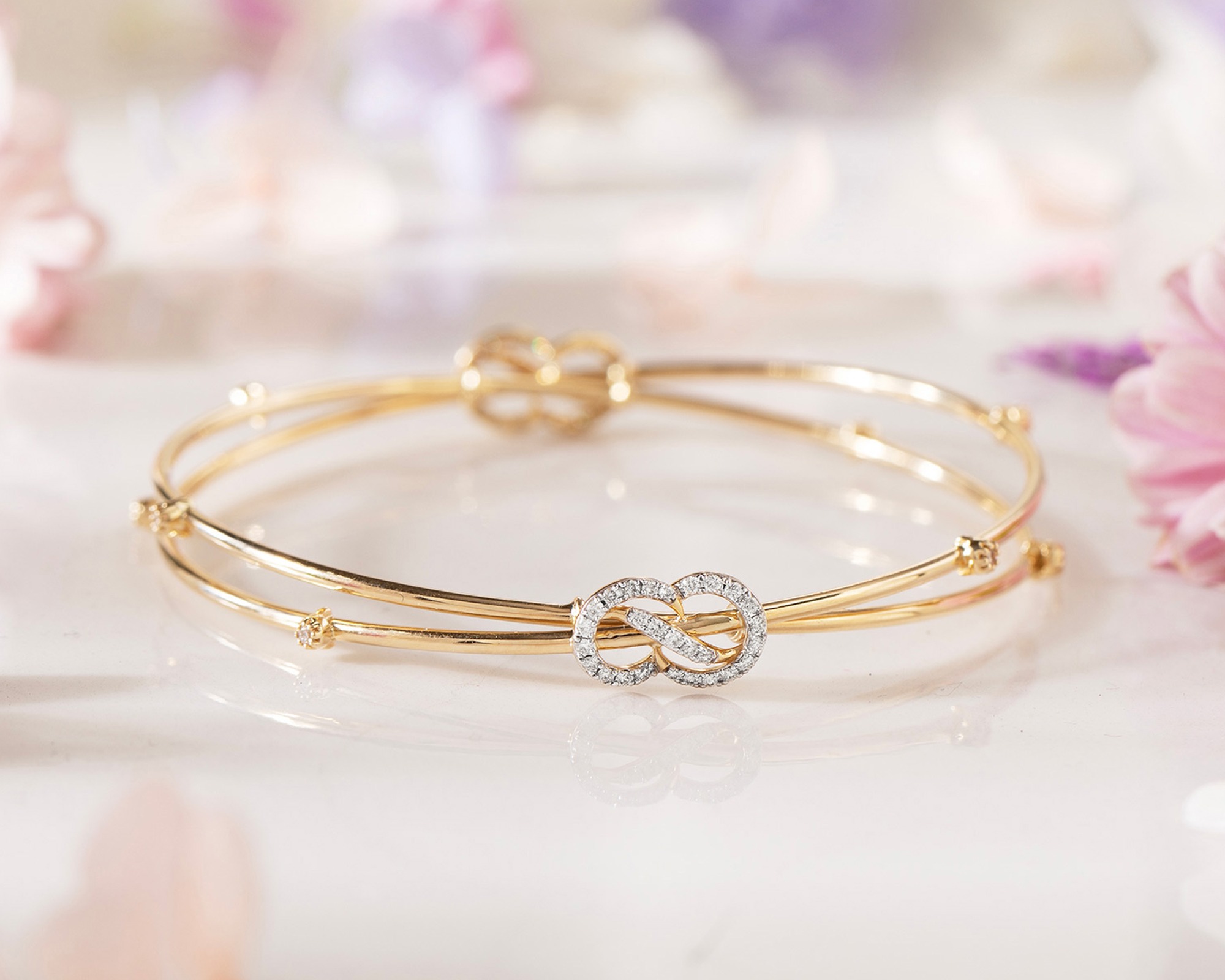 weightless gold bangles